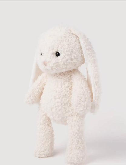 Zijaanzicht van de Retro Pals Konijn knuffel, staand