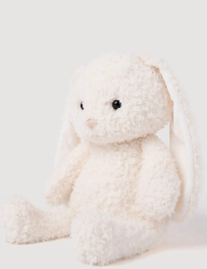Zijaanzicht van de Retro Pals Konijn knuffel, zittend