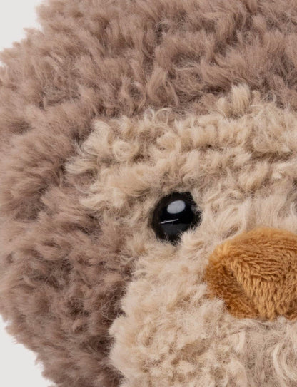 Close-up van het oog van de Retro Vrienden Aap knuffel